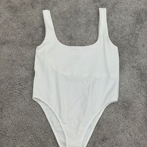 a new day White Bodysuit